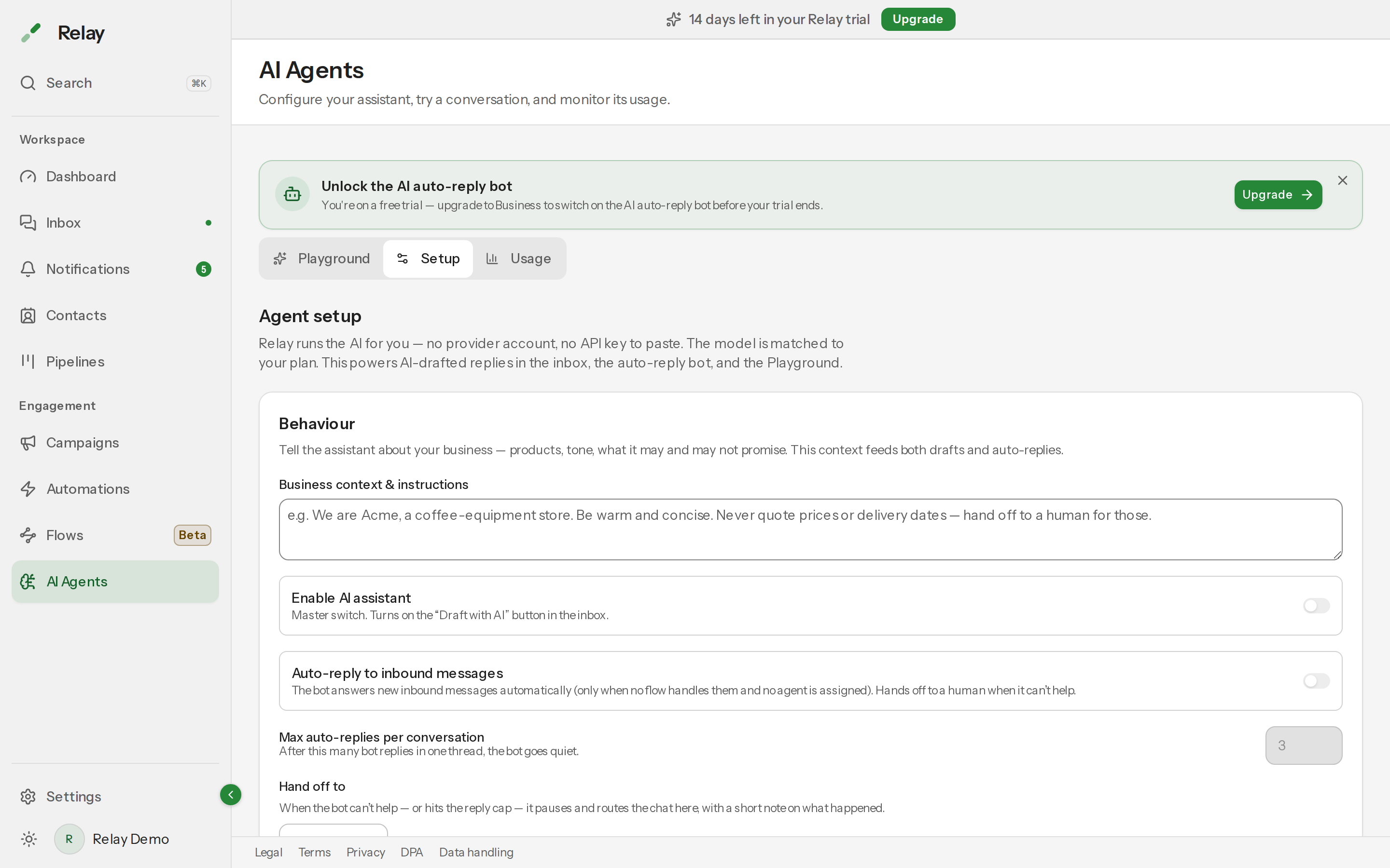 The Setup tab of the AI Agents page showing Business context & instructions, the Enable AI assistant and Auto-reply switches, Max auto-replies per conversation and Hand off to.