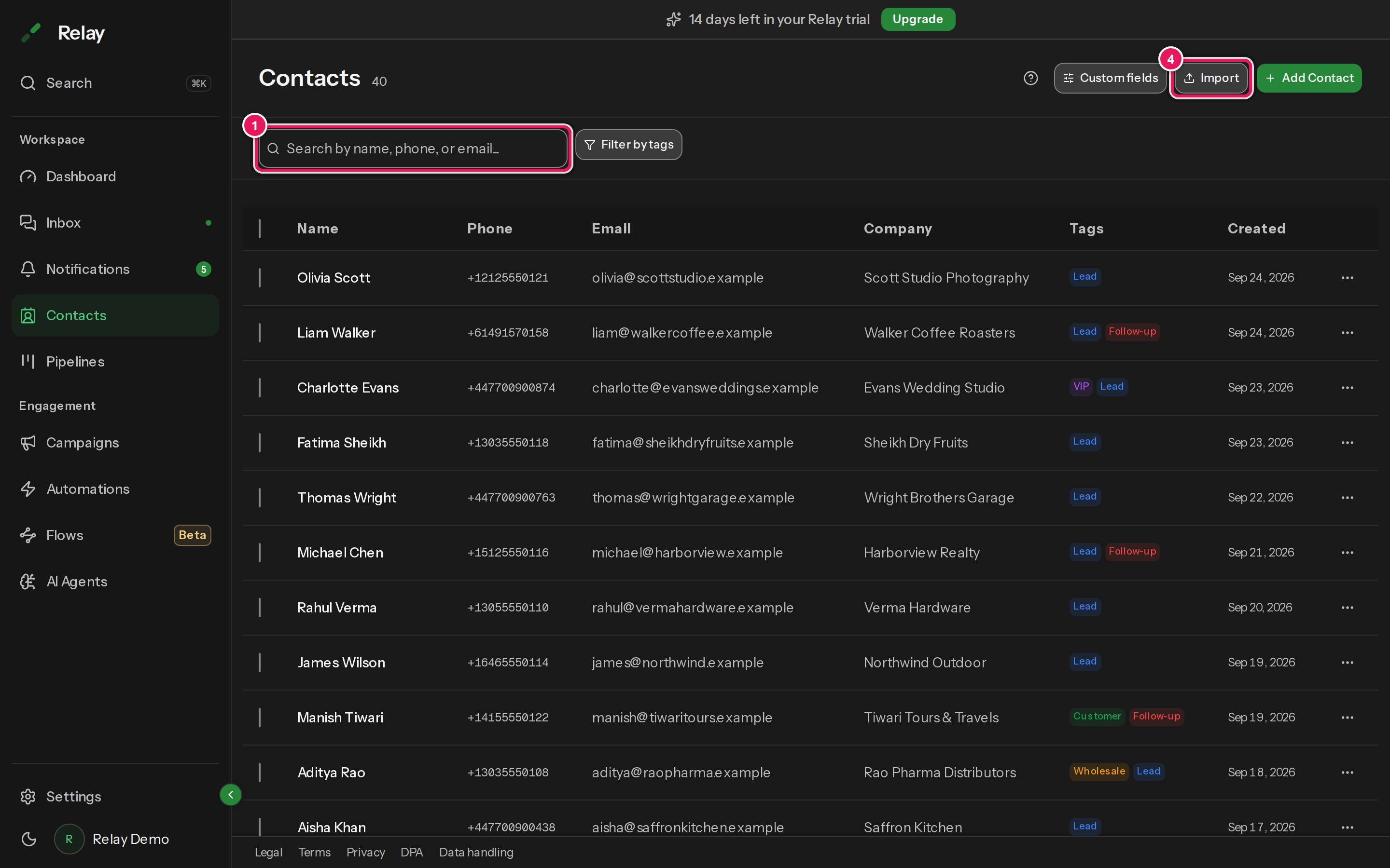 The Contacts page with a search box, the Filter by tags button and a table of contacts with Name, Phone, Email, Company, Tags and Created columns.